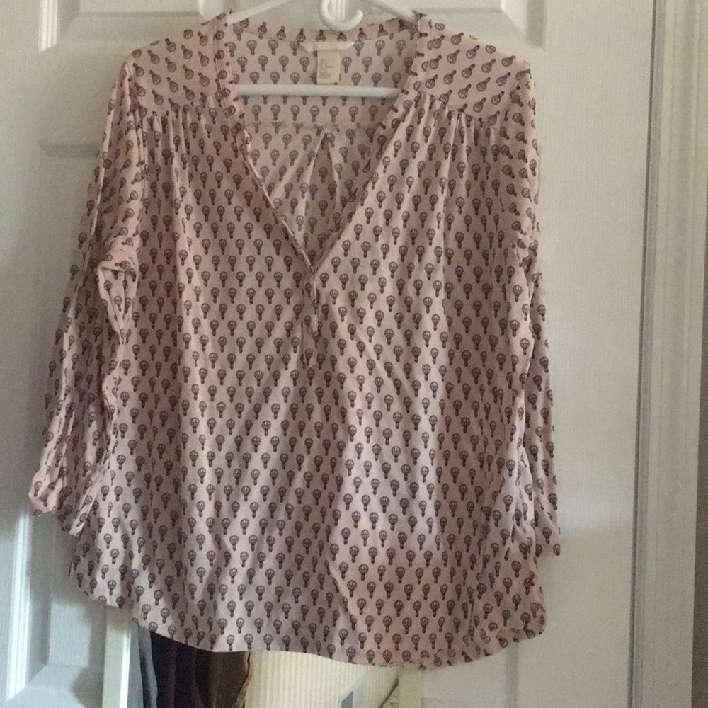Light pink three quarter sleeve blouse